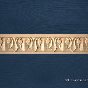 May include: A carved wooden decorative molding with a repeating leaf design. The molding is light brown and set against a dark blue wood grain background. The text "MASTERBUK" is at the bottom.