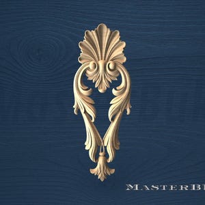 May include: A carved wooden decorative element with an ornate, symmetrical design. The piece features a central fan-like top, flowing curves, and leaf-like details. The background is a dark blue wood grain. The text "MASTERBUK" is at the bottom.