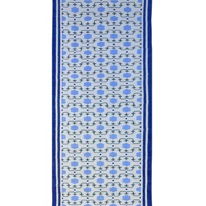 May include: A blue and white patterned rug with a blue border. The pattern features a repeating design of stylized flowers and geometric shapes.