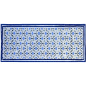 May include: A white and blue patterned rug with a blue border. The rug has a geometric design with repeating shapes.