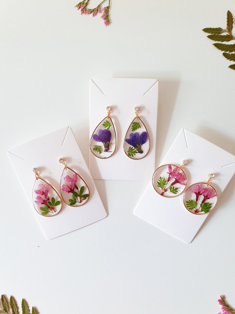 Pink resin earrings with real flowers cherry
