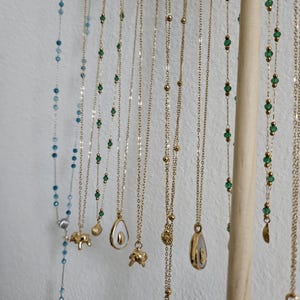Collana multifilo con pietre e perle