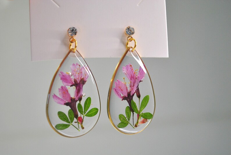 Pink resin earrings with real flowers cherry