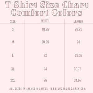 May include: T-shirt size chart for Comfort Colors brand. The chart shows sizes S through 2XL with corresponding width and length measurements in inches.