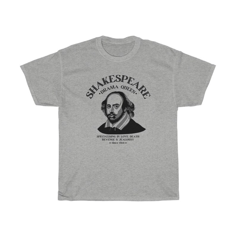 May include: Grey t-shirt featuring a black and white illustration of William Shakespeare. The text reads "Shakespeare. Drama Queen. Specialising in love, death, revenge & jealousy. - Since 1564 -"