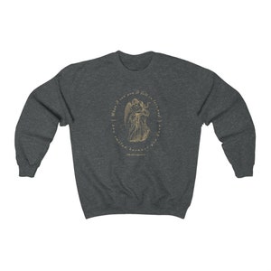 May include: A dark heather grey sweatshirt with a gold graphic of two angels embracing. The graphic is surrounded by a circle with the text "When I saw you I fell in love, and love'd you, and must love you still" and "Shakespeare".