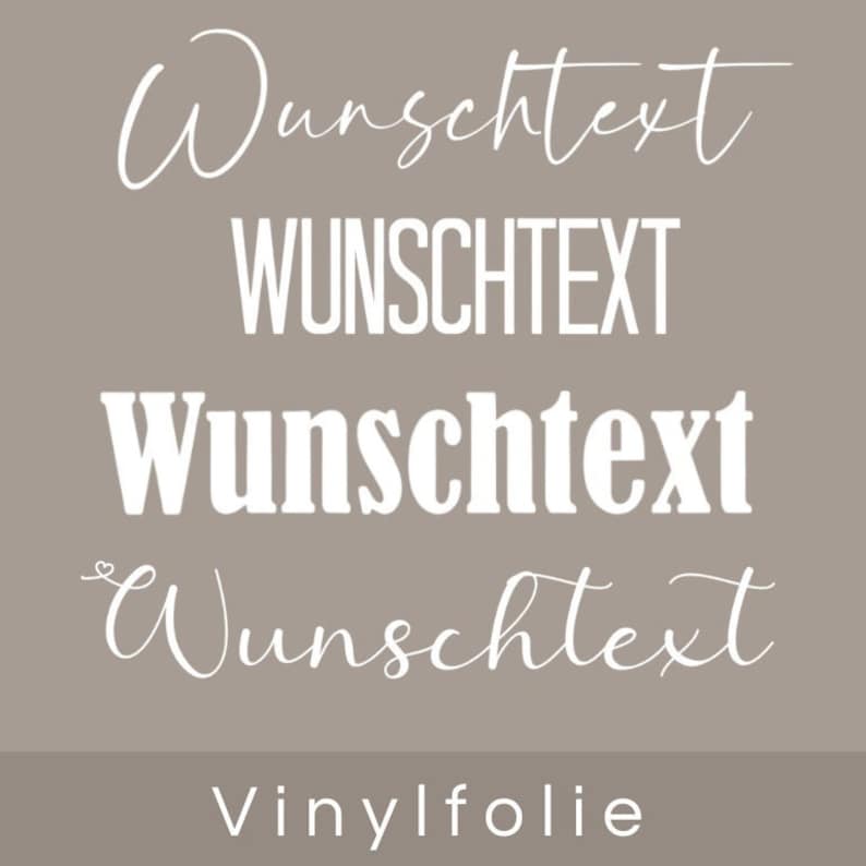 May include: White vinyl sticker with the text "Wunschtext" in different fonts and styles. The text "Vinylfolie" is also included at the bottom of the sticker.