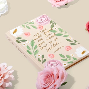May include: A floral journal with the quote "The Lord will fight for you, you need only to be still."  Exodus 14:14 printed on the cover.