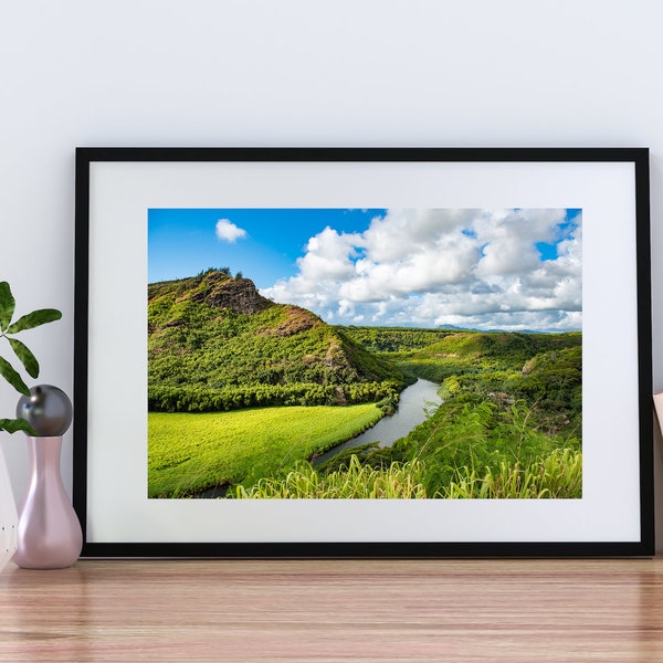 River Running Through Green Mountains in Wailua River State Park in Hawaii