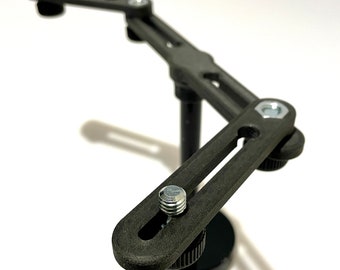 Microphone rail with adjustable arms