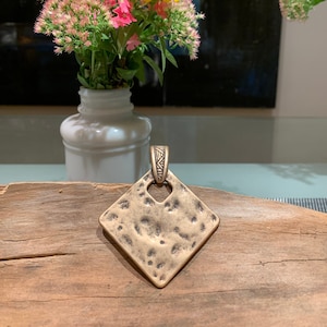 Vintage Diamond Shaped Hammered Brass Pendant. Please read the description