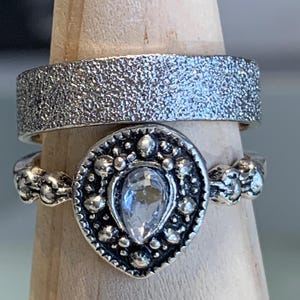 Vintage Silver Tone Rhinestone Rings, Set of 2 Size 7.5 Please read the description.