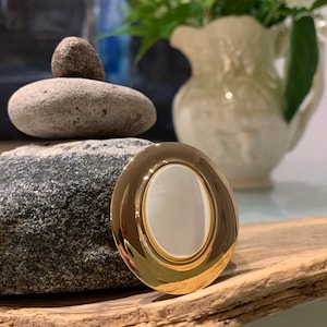 Vintage Gold Tone and Mother of Pearl Lapel Clip.