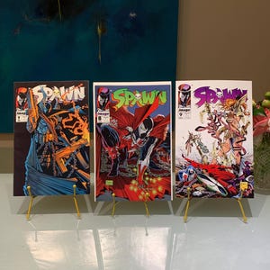 Vintage SPAWN Comics #7-#9. Includes 2 Poster Inserts and features the talent of Todd McFarlane. 1993