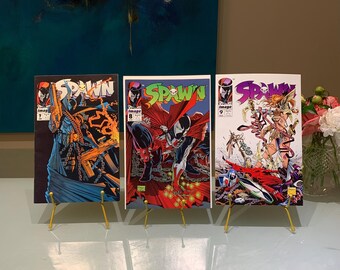 Vintage SPAWN Comics #7-#9. Includes 2 Poster Inserts and features the talent of Todd McFarlane. 1993