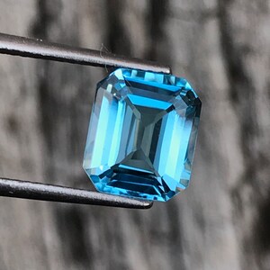 Swiss Blue Topaz: 4.15 Carat Emerald Cut Gemstone, December Birthstone