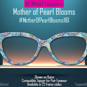 May include: Floral patterned eyewear topper with the text "Mother of Pearl Blooms" and "#MotherOfPearlBlooms1161". The topper is shown on a Quinn frame and is compatible with pair eyewear. The background is a gradient of blue and orange.