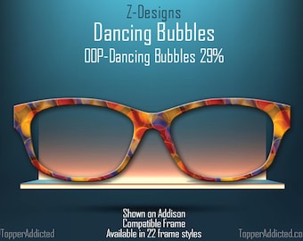 Adorno para gafas con diseño de burbujas danzantes, alegre y vibrante. Disponible en todos los estilos de montura, en metal, con envío rápido y potentes imanes.