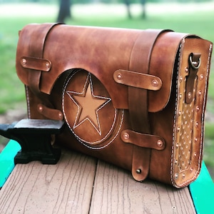 Hand made 100% leather messenger bag with star inlay