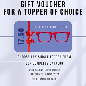 May include: A gift voucher with the text "GIFT VOUCHER FOR A TOPPER OF CHOICE". The voucher is a blue rectangle with a red ribbon and bow, and a red glasses frame. The voucher is for $17.50.