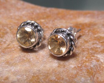 Silver 925 cut citrine stud butterfly earrings.