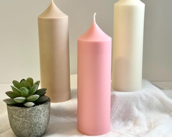 Neutral Chic: Classic Pillar Candles for a Touch of Elegance