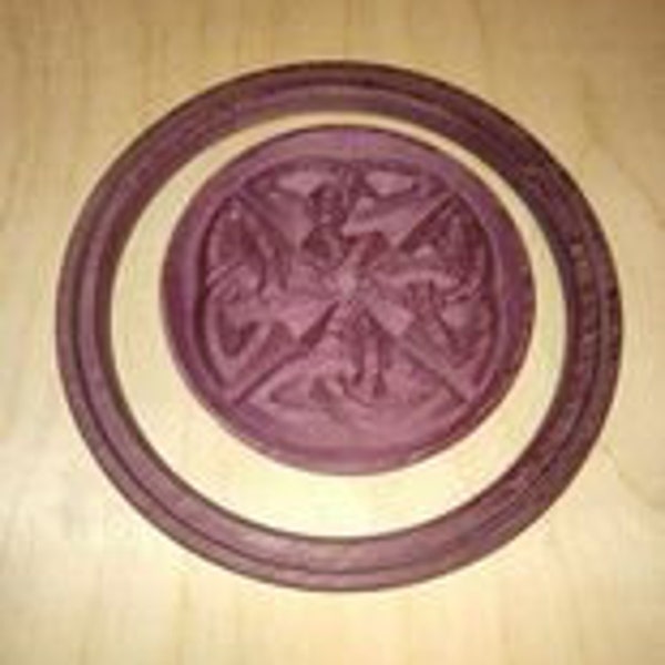 Carved Celtic knot 4.25 inch purple heart base with 6 inch ring.