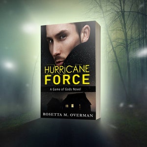 May include: A book cover for "Hurricane Force: A Game of Gods Novel" features a man's face and the title in yellow. The background shows a silhouette of a house and a misty forest, with the author's name at the bottom.