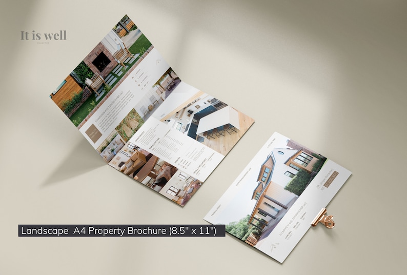 May include: A landscape A4 property brochure (8.5" x 11") with images of homes and interiors. The brochure is open, displaying multiple pages with text and photos. A separate page is also visible, held by a gold paper clip. The text "It is well" is at the top.