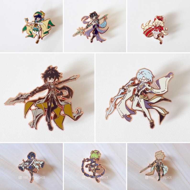 May include: Set of ten enamel pins featuring anime characters in various poses. The pins are gold-toned and have a glossy finish. The characters are depicted in a variety of colors, including blue, green, red, and yellow.