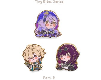 May include: Three enamel pins from the Tiny Bites Series Part 5. The top pin features a character with purple hair and a hood. The bottom left pin shows a blonde character, and the bottom right pin depicts a character with dark hair and glasses. Each pin is labeled RistArt.