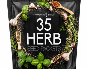 May include: A black pouch labeled GARDENERS BASICS 35 HERB SEED PACKETS in white text. The design features a circular arrangement of fresh green basil leaves, garlic cloves, peppercorns, and wooden scoops filled with spices on a dark wood background.