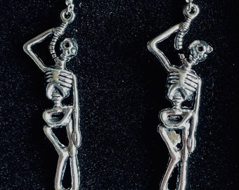 Handmade silver hanging skeleton earrings with solid silver ear wires