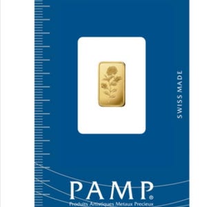 May include: A gold bar with a rose design, packaged in a blue card with the text "The Art of Precious Metal Transformation" and "PAMP Produits Artistiques Metaux Precieux" and "SWISS MADE".