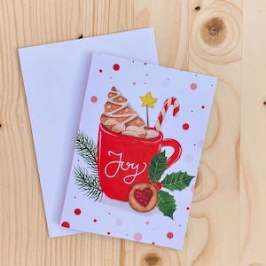 Tarjeta navideña / Taza de alegría con galletas y acebo / Tarjeta festiva de acuarela / Interior en blanco / Tarjeta de felicitación festiva