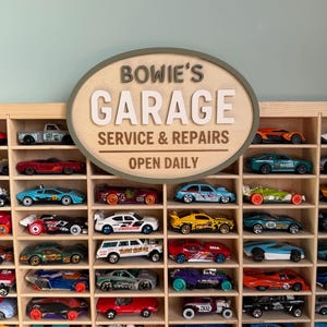 May include: A distressed wooden sign, reading "Welcome to our home" in white lettering. The sign has a rustic finish, ideal for adding a welcoming touch to any home's entrance.
