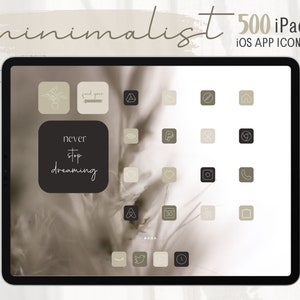 Peut inclure: L'écran d'une tablette numérique affiche une collection d'icônes d'applications minimalistes disposées en grille. Les icônes sont dans des tons de brun et de noir, avec des contours blancs. Les icônes comprennent une plante, une maison, un cœur, un appareil photo, un téléphone, un calendrier, une horloge et un oiseau. Le texte "never stop dreaming" est affiché en blanc sur fond noir.
