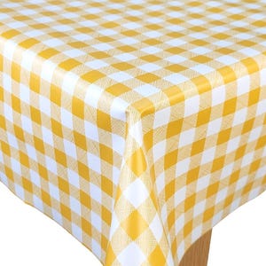 May include: Yellow and white gingham tablecloth. The tablecloth is made of vinyl and has a glossy finish.