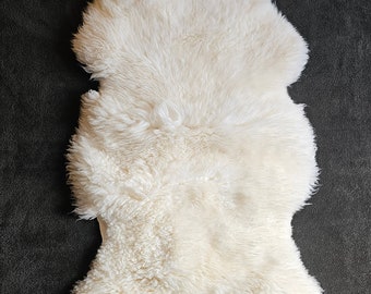 Beautiful Sheepskin, Rug, Pet bed, Throw, accent piece. Super soft, Imported from Poland directly to me, eco friendly, all natural, undyed.