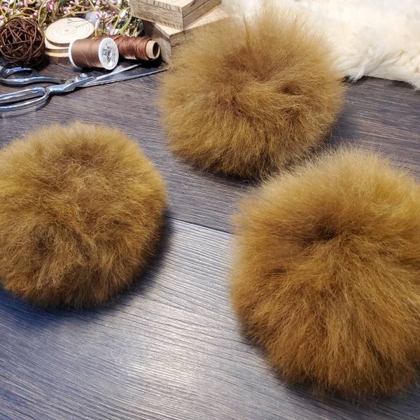 Alpaca fur pompoms. Catnip infused options. All natural, Real fur, all organic, handmade. Imported furs from Peru. Free shipping. Cat toys.