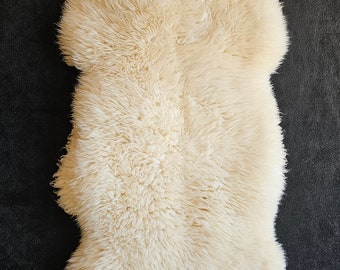 Beautiful Sheepskin, Rug, Pet bed, Throw, accent piece. Super soft, Imported from Poland directly to me, eco friendly, all natural, undyed.