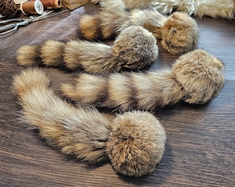 Catnip filled rabbit fur ball with less than perfect raccoon tail. Real fur cat toys, kicker toys, handmade, organic, cat toys, all natural
