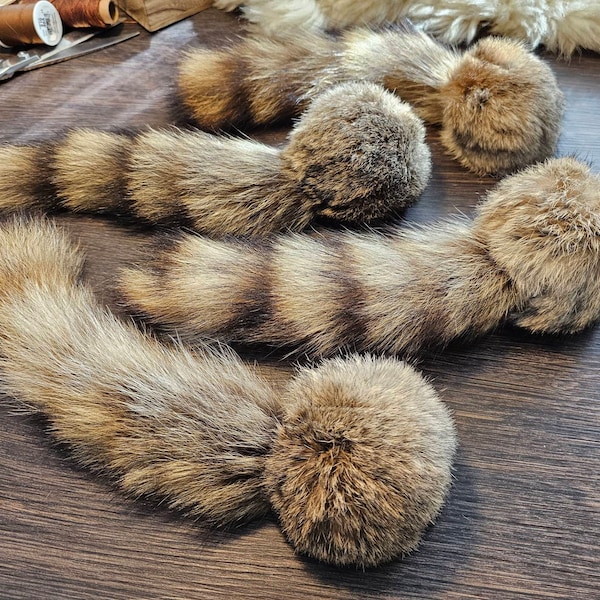 Catnip filled rabbit fur ball with less than perfect raccoon tail. Real fur cat toys, kicker toys, handmade, organic, cat toys, all natural