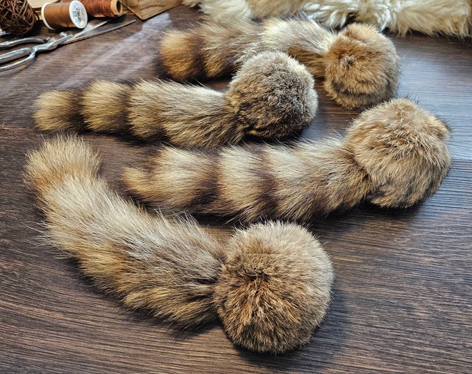 Catnip Filled Rabbit Fur Ball With Less Than Perfect Raccoon Tail. Real