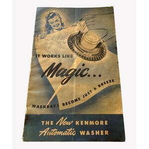 May include: Vintage Kenmore Automatic Washer advertisement. The ad features a woman smiling, a dial labeled "Wash," and the text "It Works Like Magic... Washdays Become Just a Breeze." The ad is printed on aged paper.