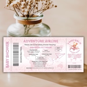May include: A pink baby shower invitation designed as a boarding pass from Adventure Airline. The invitation includes details for Samantha Patterson's baby shower, with a teddy bear graphic and the text "Baby Girl is Landing Soon."