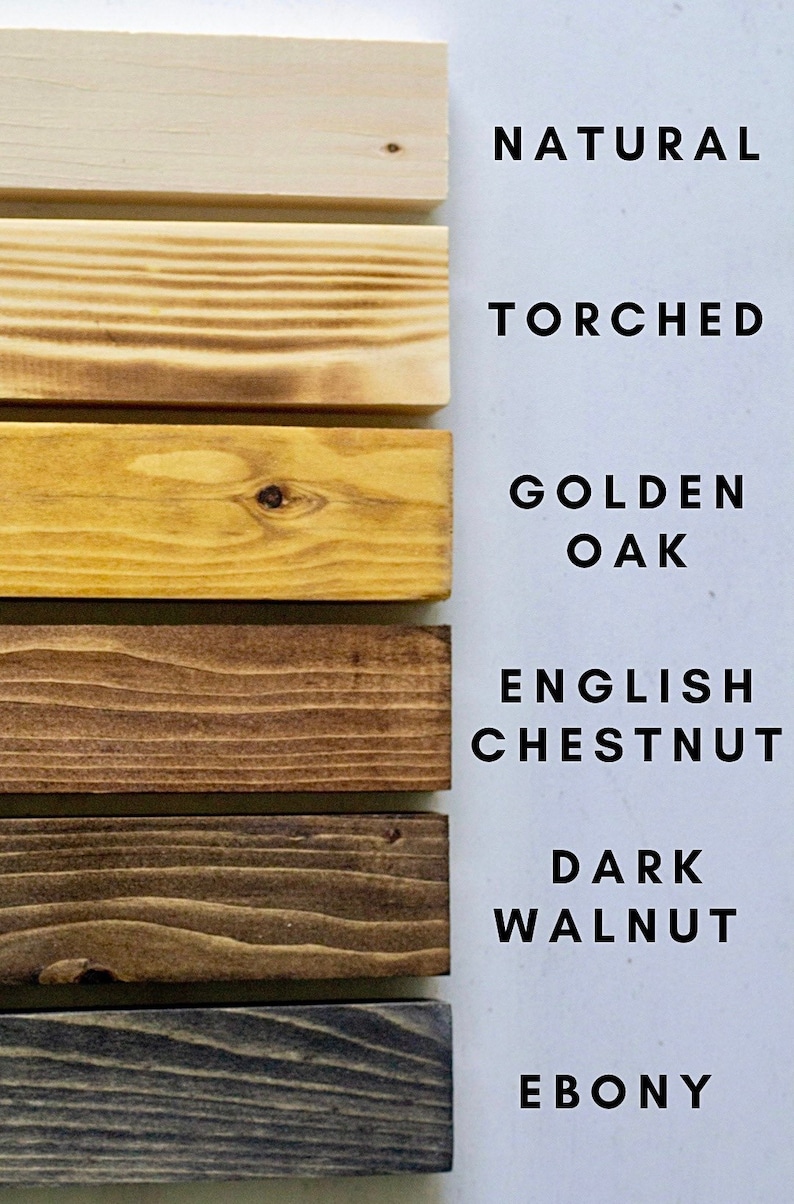 May include: Six wood samples in different shades of brown, from light to dark. The samples are labeled with the following wood types: Natural, Torched, Golden Oak, English Chestnut, Dark Walnut, and Ebony.