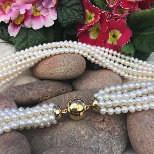 7-row river water pearl necklace with a clasp of sterling silver gold plated. 580,- Euro