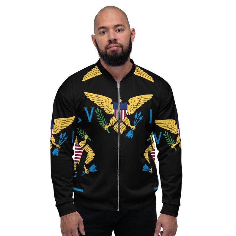 May include: A black bomber jacket with a zip fastening. The jacket features a repeating pattern of the Virgin Islands flag, which includes a yellow eagle with a blue shield and red, white and blue stripes.