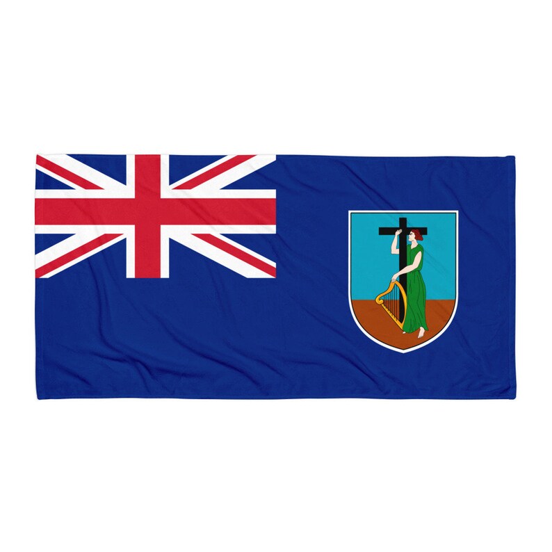 May include: The flag of Montserrat features a blue field with a Union Jack in the canton and the coat of arms of Montserrat on the fly. The coat of arms is a shield with a green background and a gold harp, a woman holding a cross, and a gold crown.
